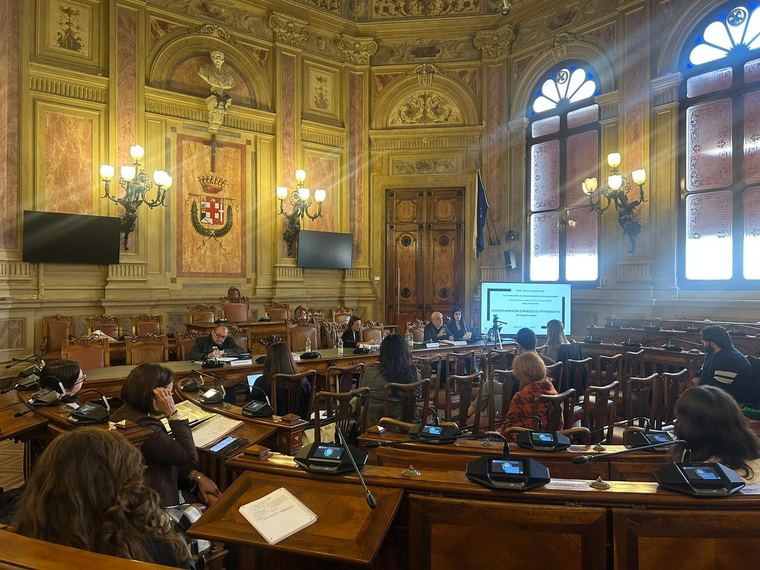 Multidisciplinary audience of justice professionals in the Sala Consiliare
